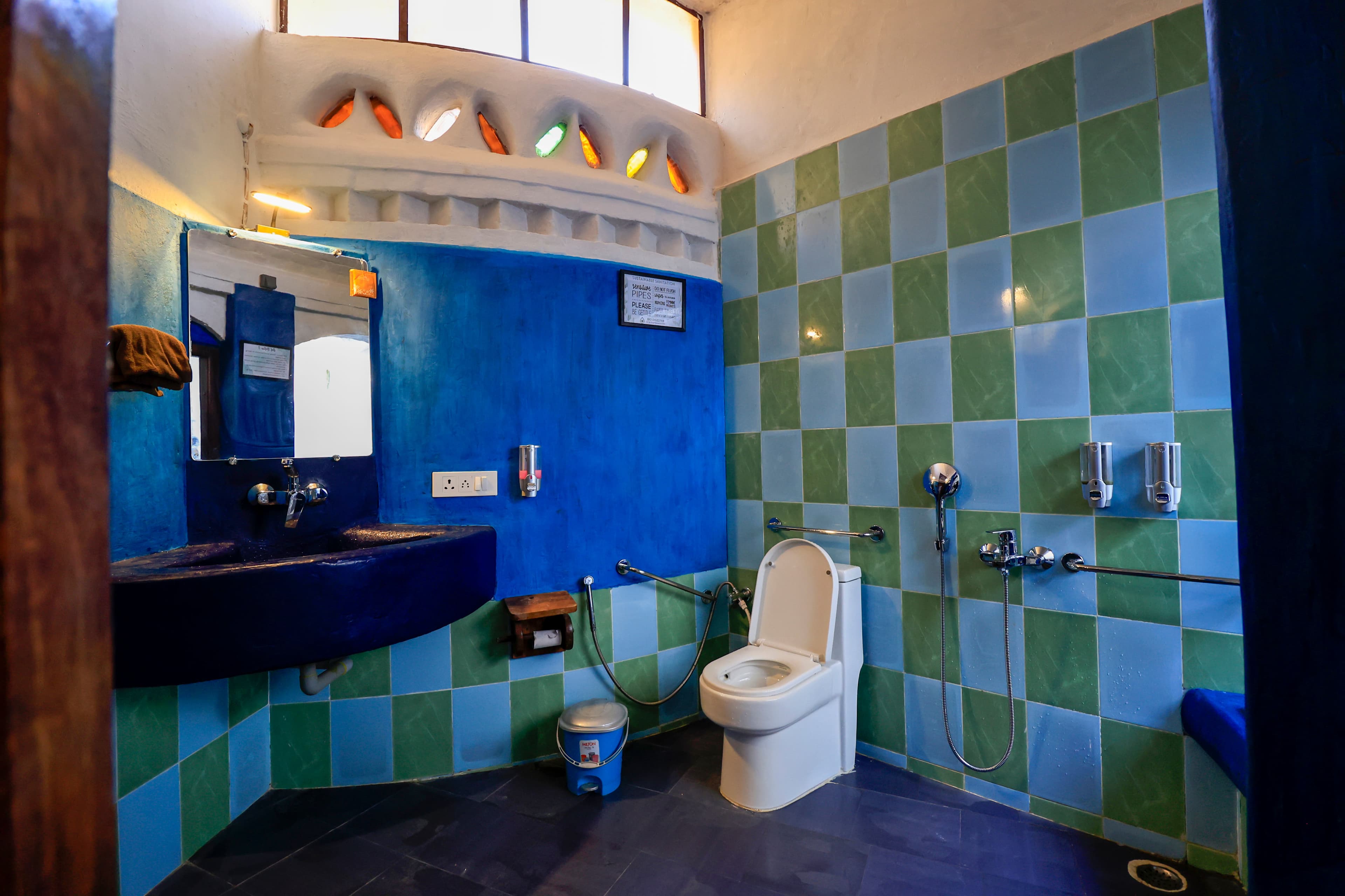 Luxury bathroom with natural stone and forest views